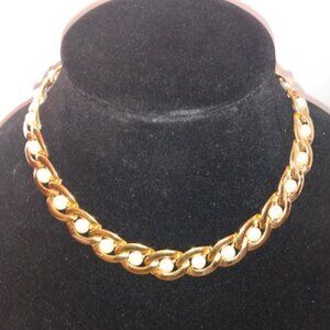 Napier: Gold tone metal link necklace with faux pearls.